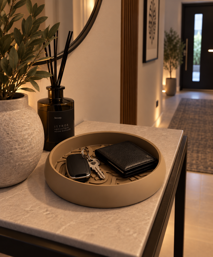 Arabic calligraphy catchall tray in Dune finish styled on an entryway console table with keys and wallet