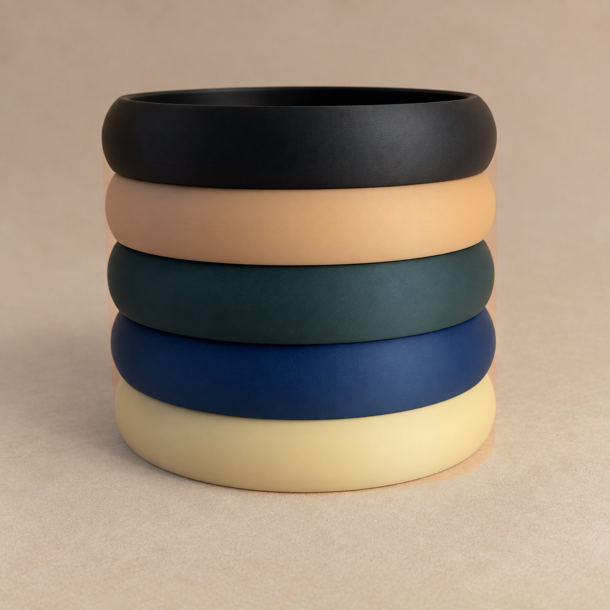 Arabic calligraphy catchall tray shown in all five matte colourways stacked together